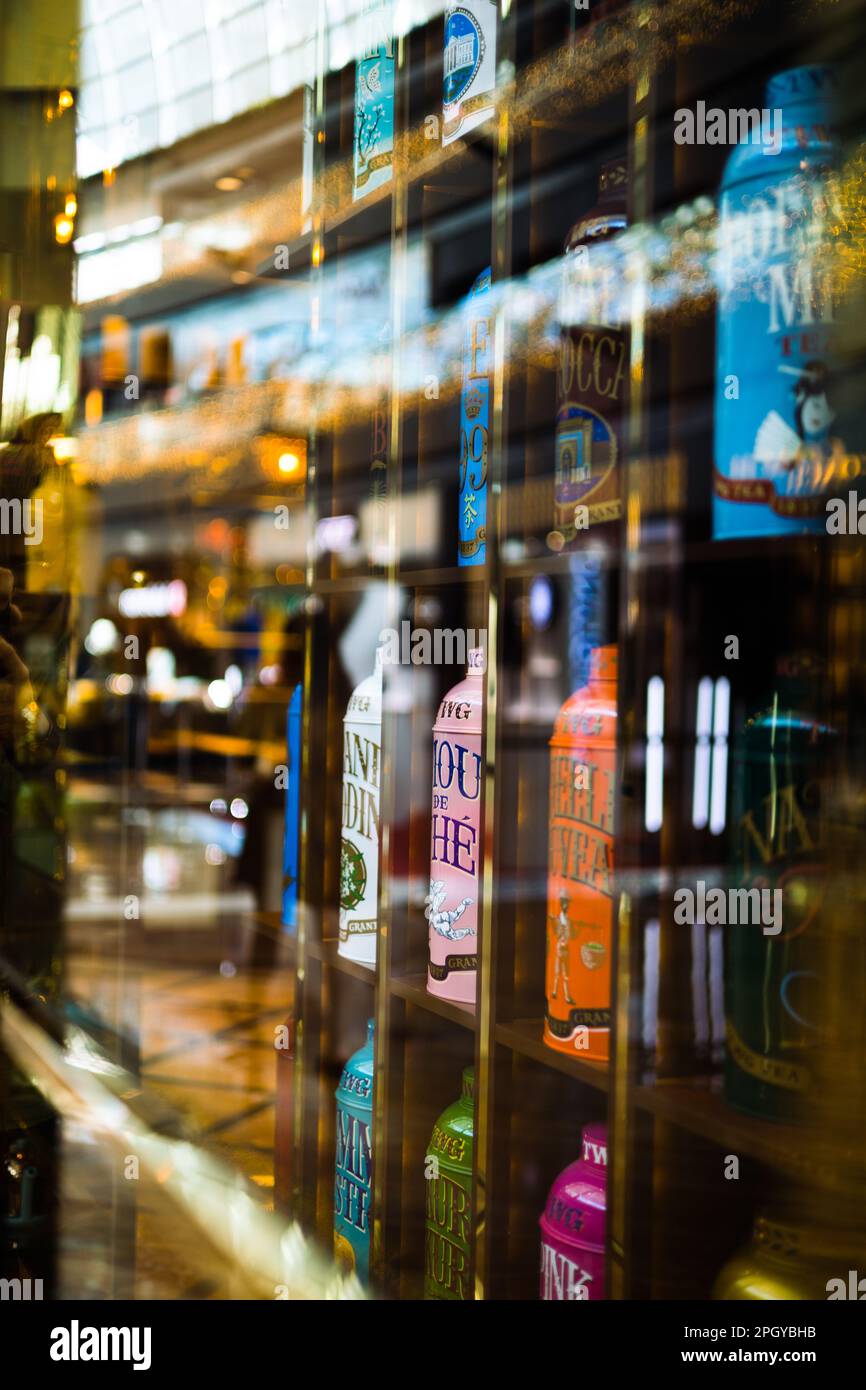 Tea Shop Glass Reflection in the Marina Sands Bay Shopping Mall in Singapore Stock Photo