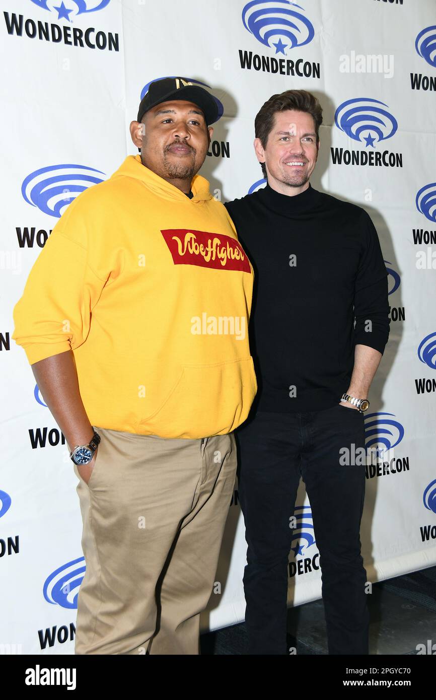 Omar Miller and Steve Howey arrive at the CBS photocall for True Lies at WonderCon 2023 Day 1 at the Anaheim Convention Center on March 24, 2023 Stock Photo