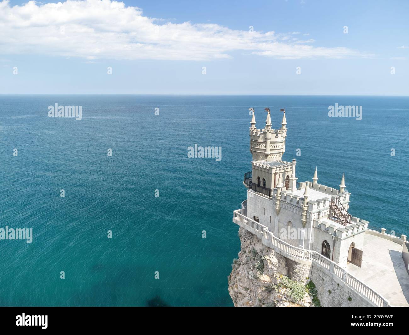 Crimea Swallow's Nest Castle on the rock over the Black Sea. It is a tourist attraction of Crimea. Amazing aerial view of the Crimea coast with the Stock Photo