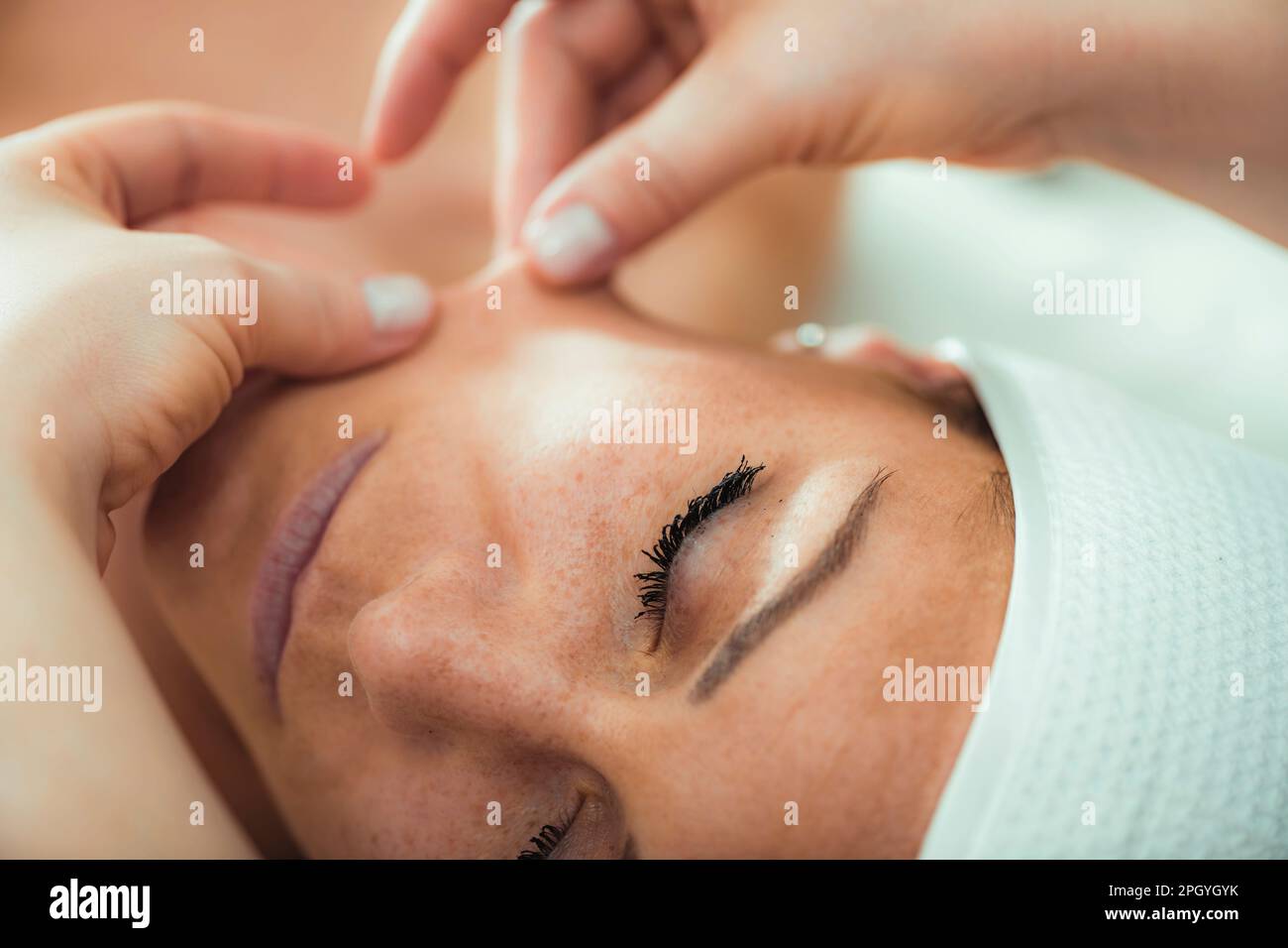 Face lifting massage Stock Photo