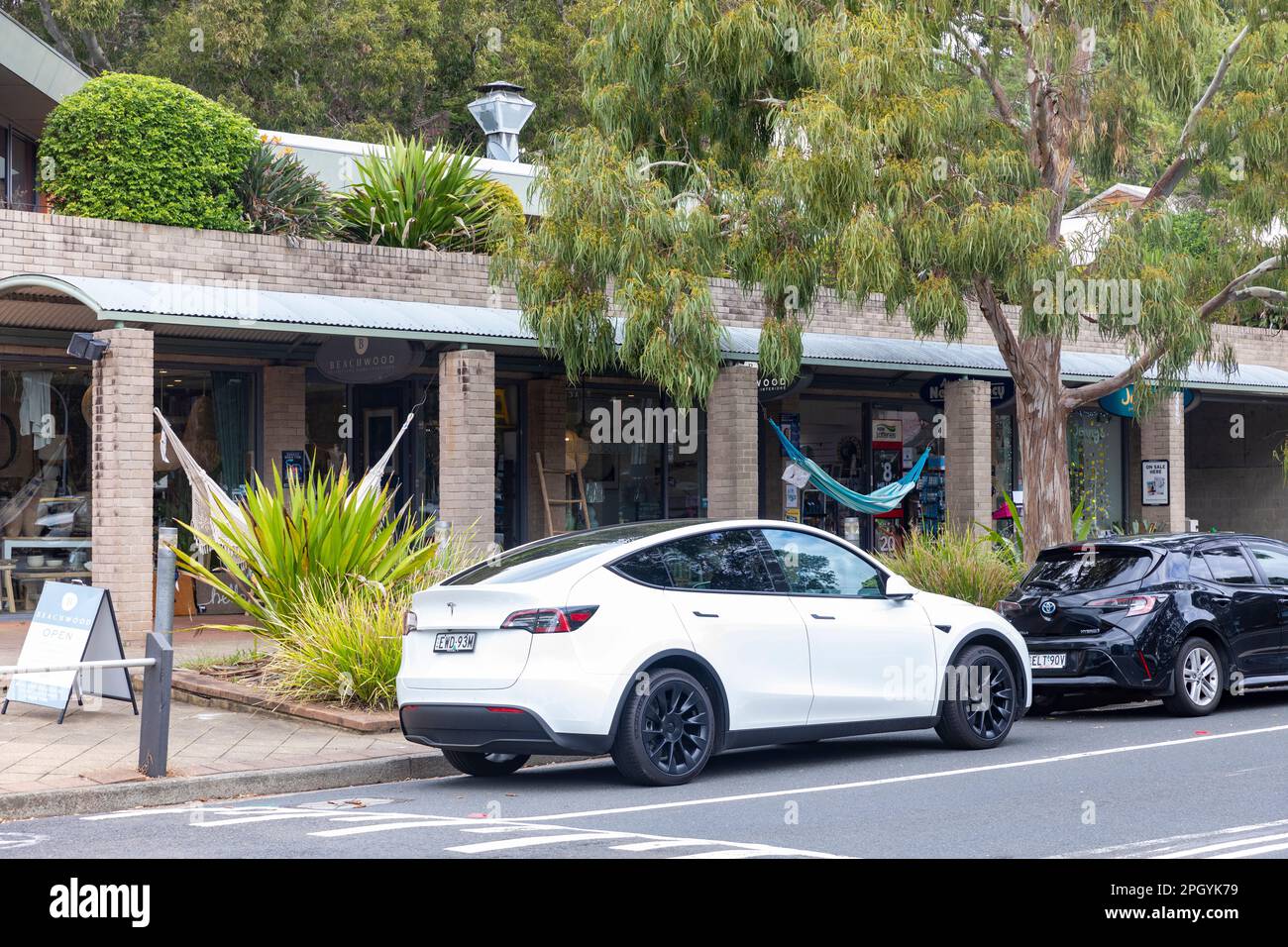 2023 white Tesla Model Y parked in Avalon Beach,Sydney,NSW,Australia Stock Photo