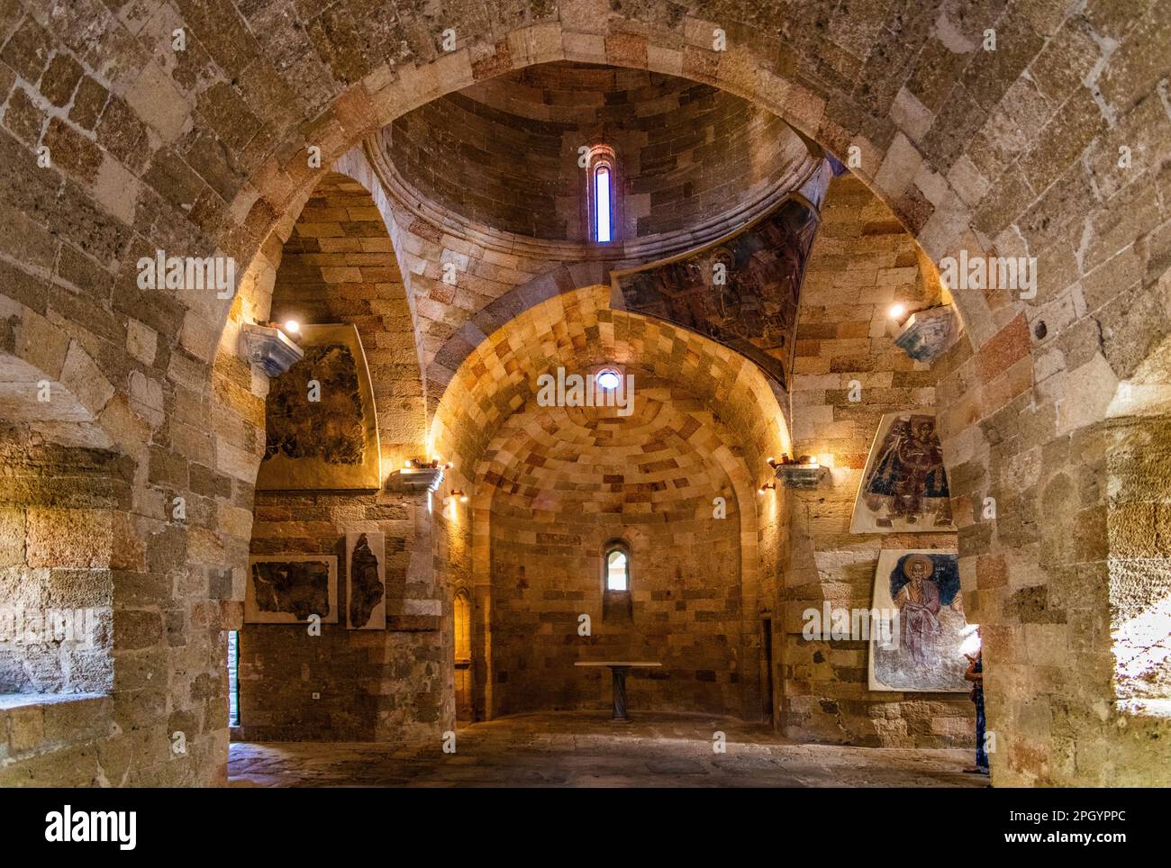 Round building with three attached vaulted naves with four aisles ...