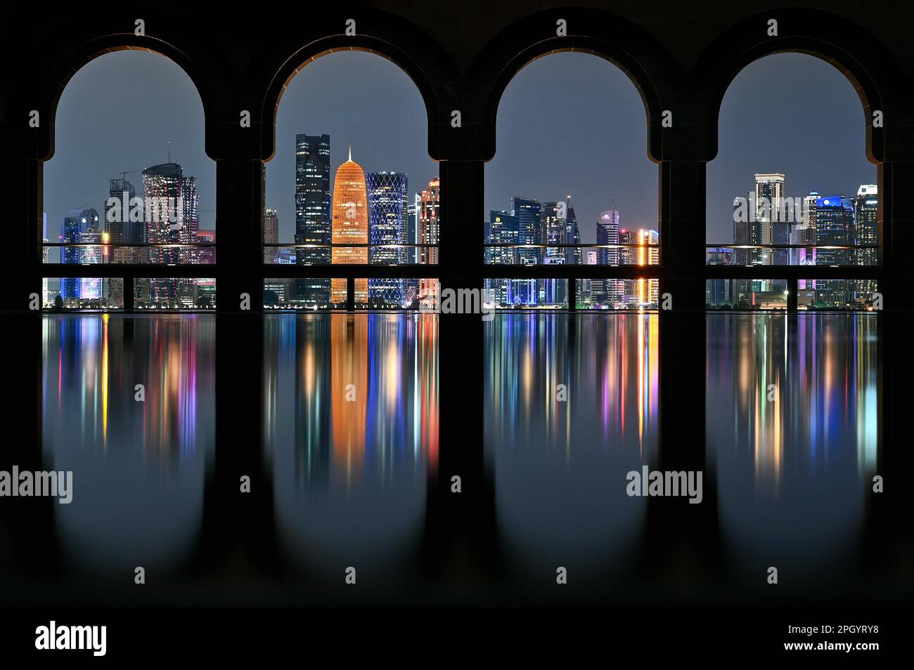 View of the illuminated skyline of Doha, Qatar, from the terrace of the ...
