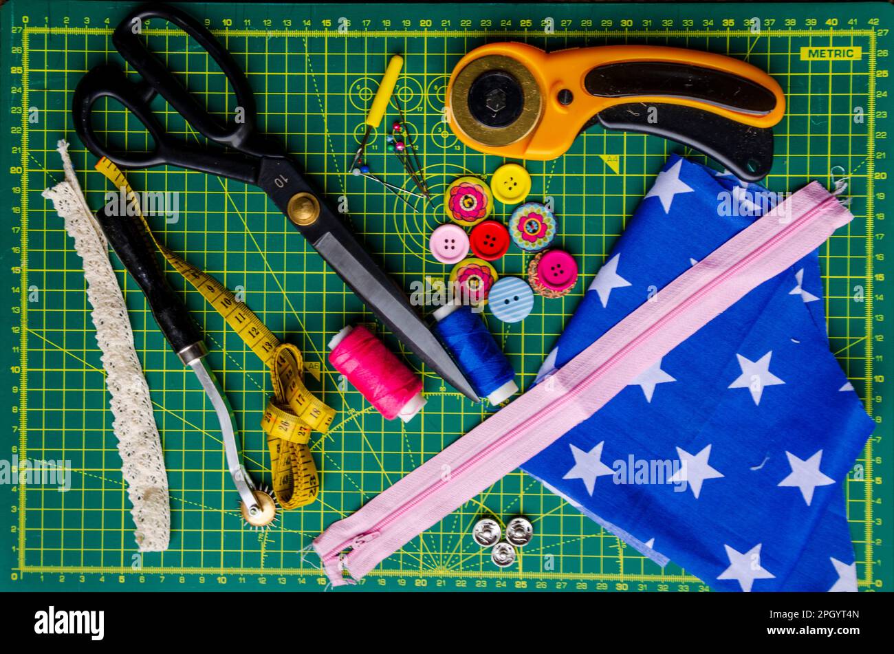 dressmaking equipment on a self healing cutting mat Stock Photo