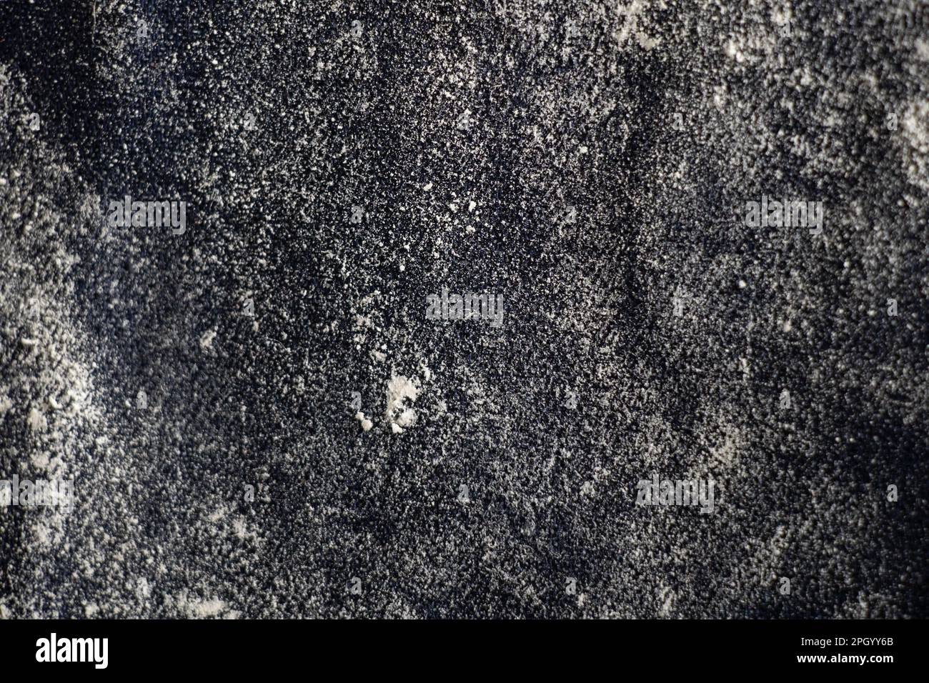 dark cloth in flour as background close up Stock Photo