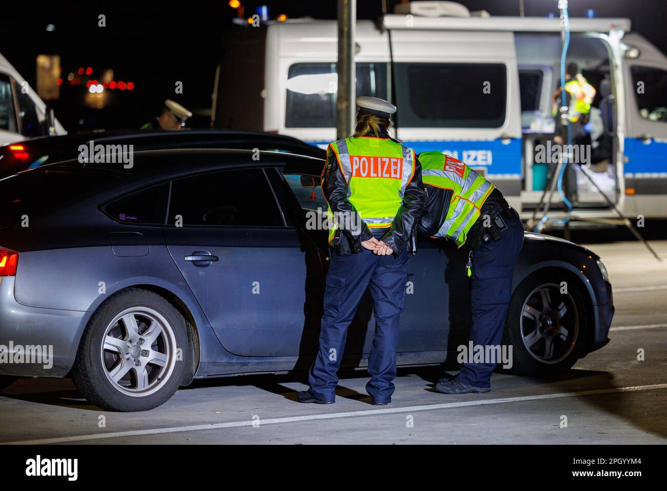 Armsheim, Germany. 23rd Mar, 2023. Police officers check a vehicle ...