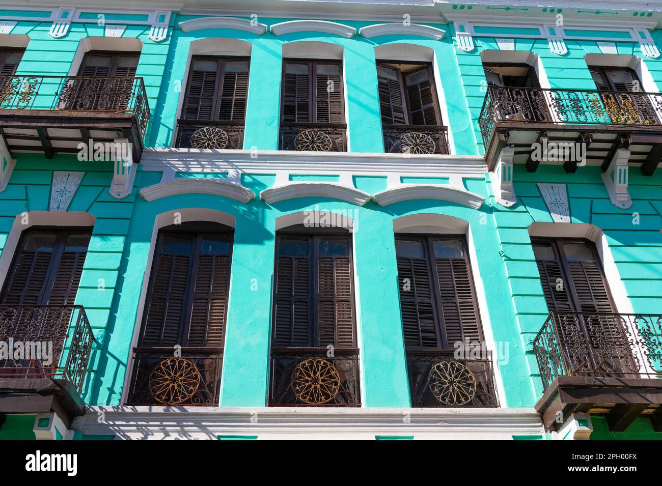 balcony railings on blue house. balcony railings facade. balcony