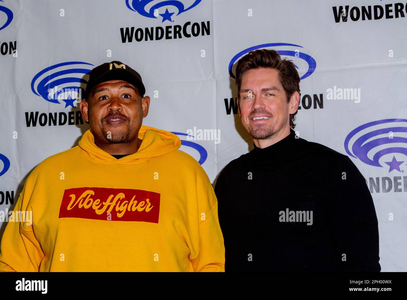 Omar Miller, Steve Howey at the press room for 'True Lies'  during the 2023 WonderCon convention at the Anaheim Convention Center, Anaheim, CA on Frid Stock Photo