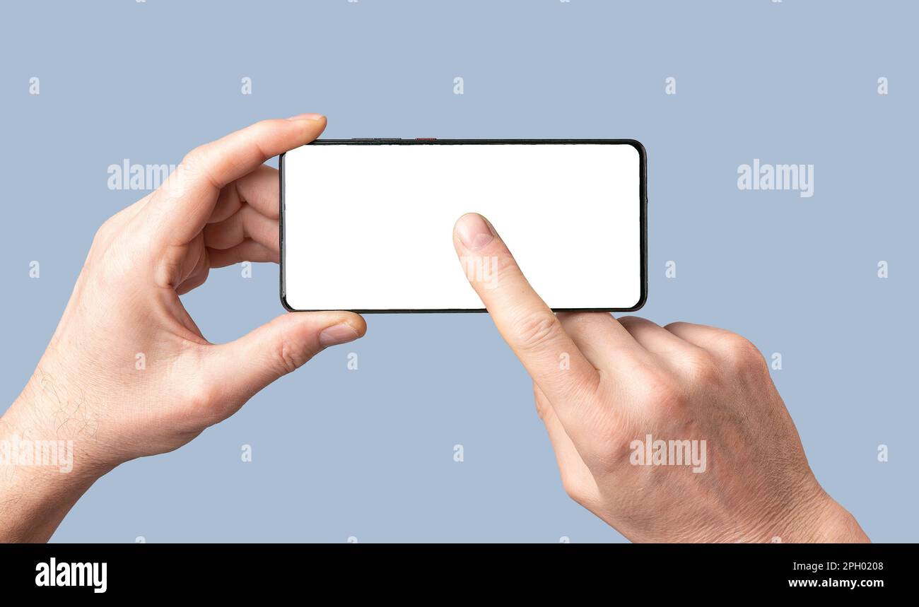 Mobile phone screen mock-up. Hands holding cellphone, pressing, clicking, touching play on smartphone screen display mockup. Stock Photo