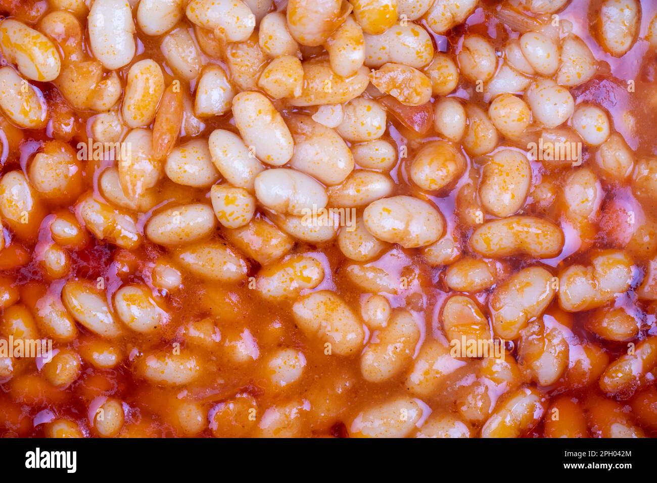 Dry bean meal. Top view of dried bean dish in a pot. Local name kuru