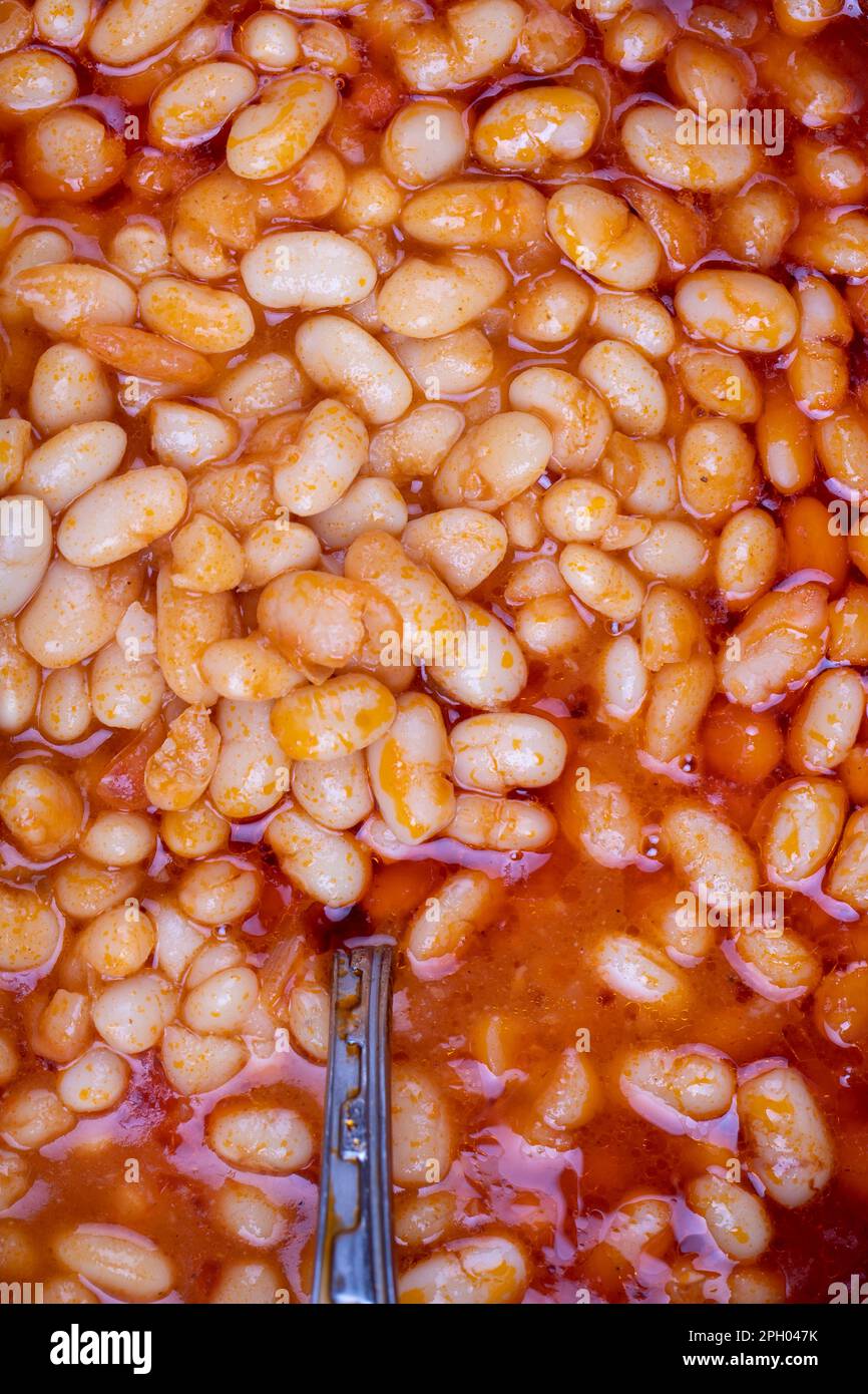Dry bean meal. Top view of dried bean dish in a pot. Local name kuru