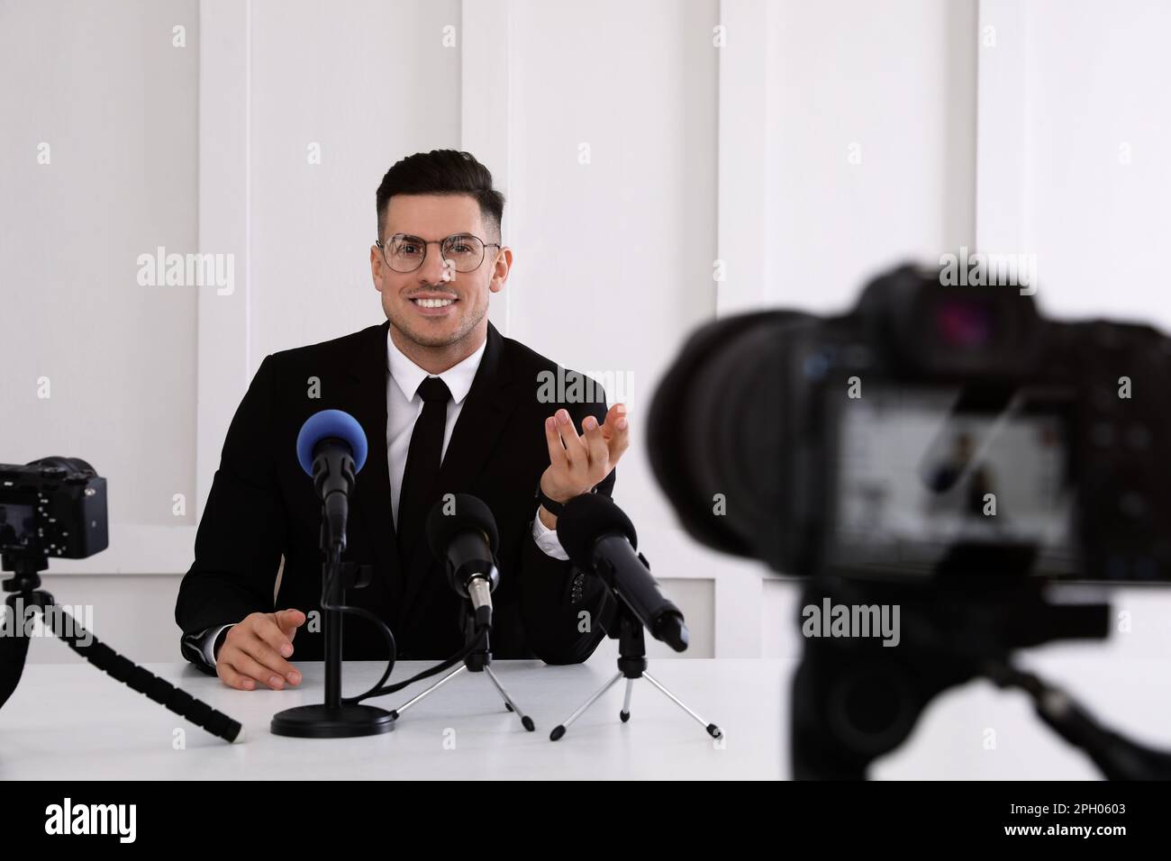Business man giving interview at official event Stock Photo