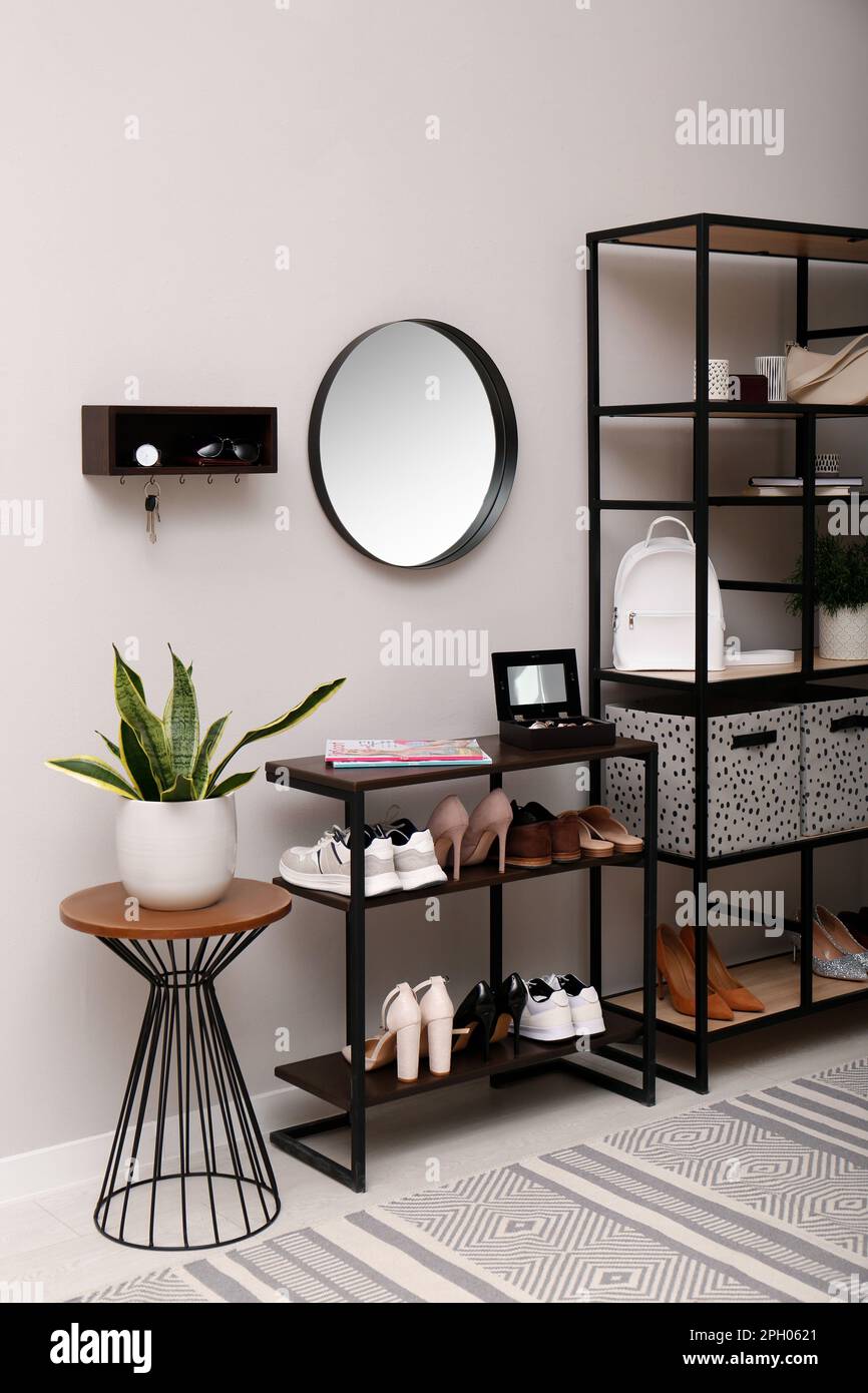 Stylish hanger for keys on white wall in hallway Stock Photo Alamy