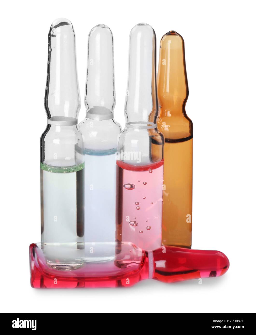 Glass ampoules with pharmaceutical products on white background Stock