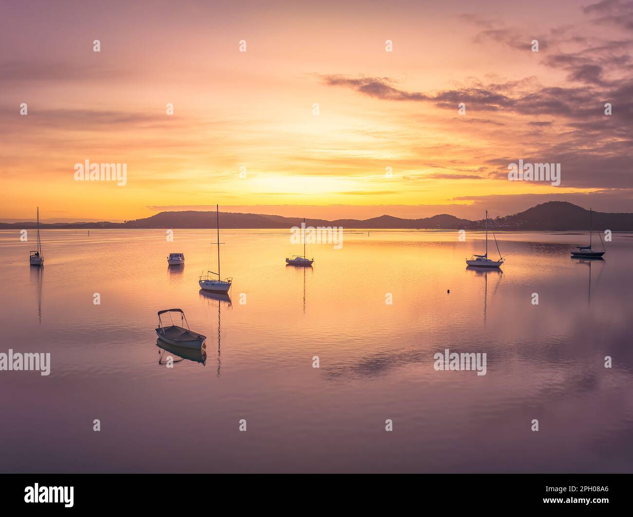 Sunrise over Brisbane Water at Couche Park, Koolewong on the Central Coast, NSW, Australia. Stock Photo