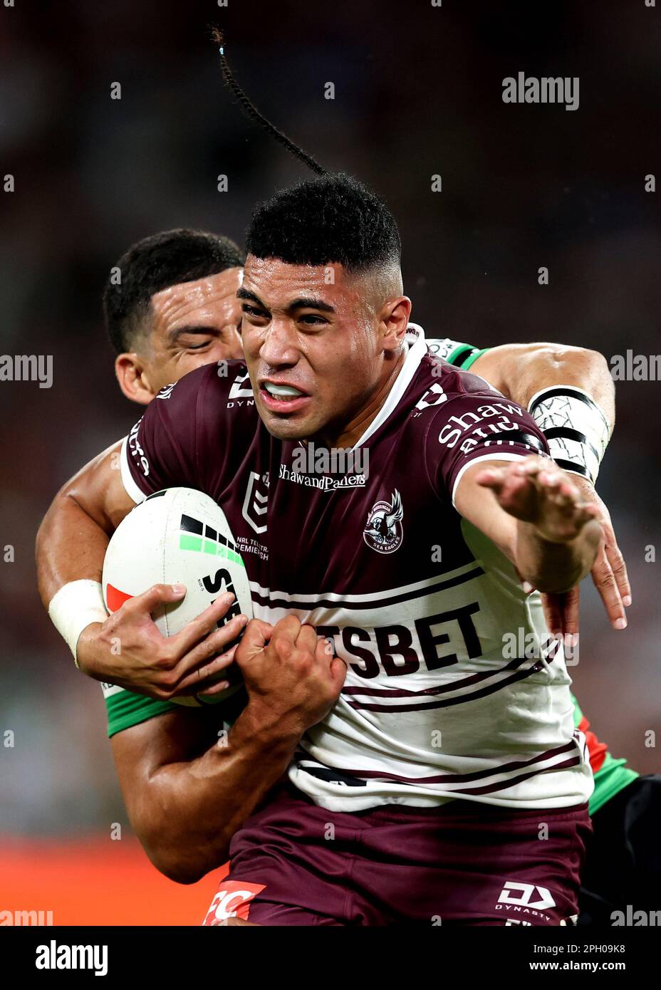Tolutau Koula of the Sea Eagles is tackled by Cody Walker of the Rabbitohs  during the NRL Round 4 match between the South Sydney Rabbitohs and the  Manly-Warringah Sea Eagles at ACCOR