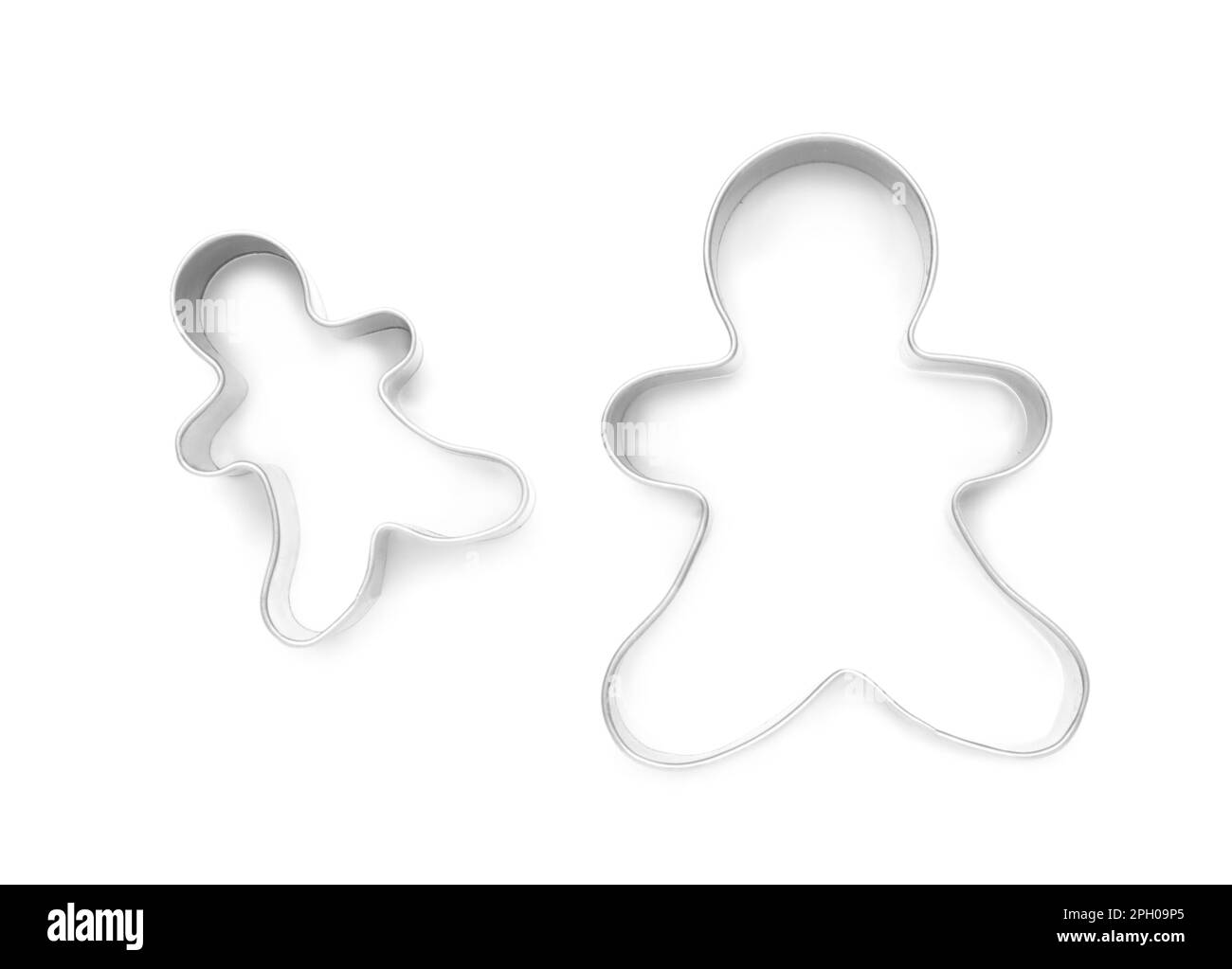 Gingerbread man cookie cutters on white background, top view Stock