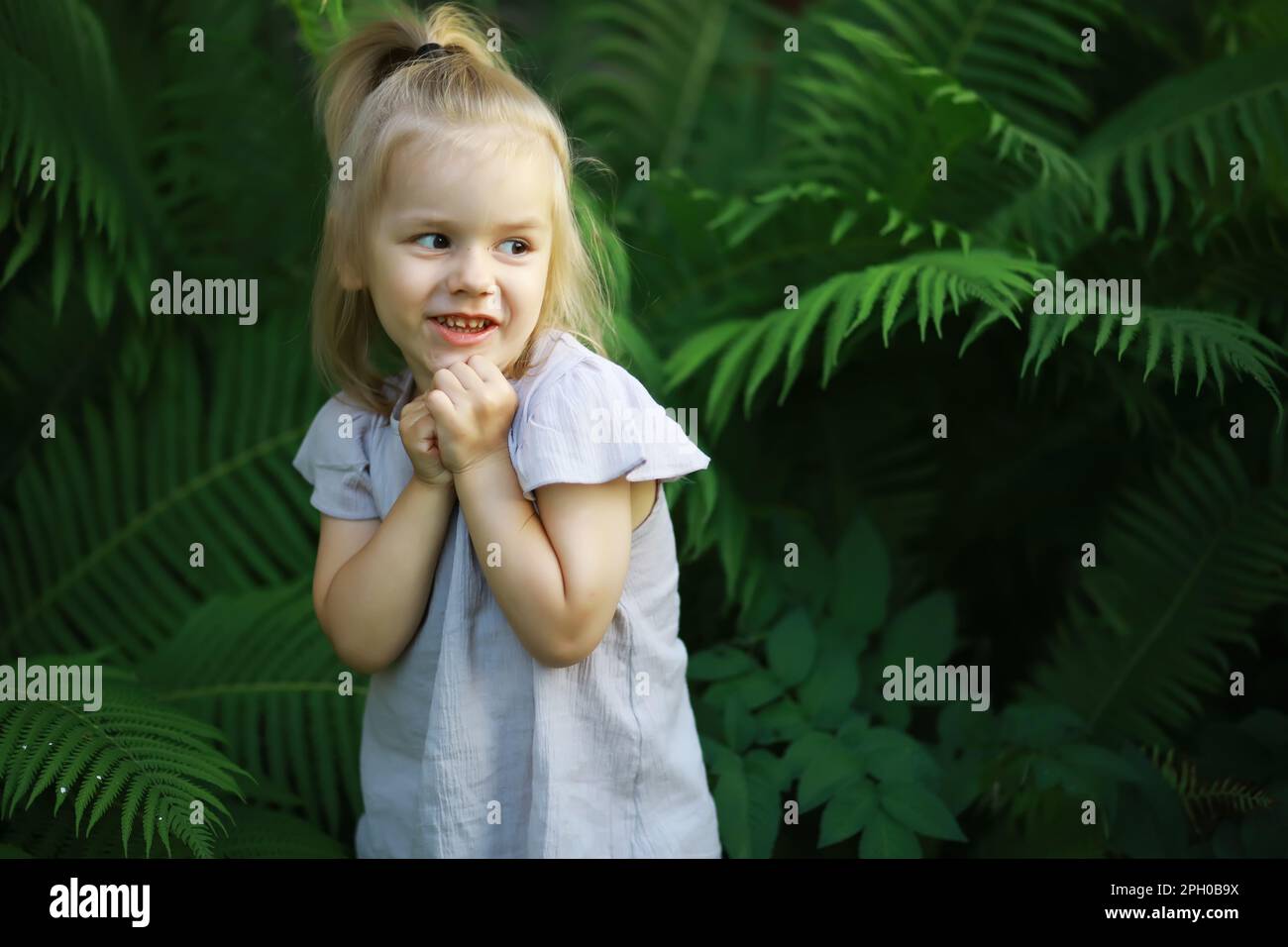 Children walk in the summer in nature. Child on a sunny spring morning