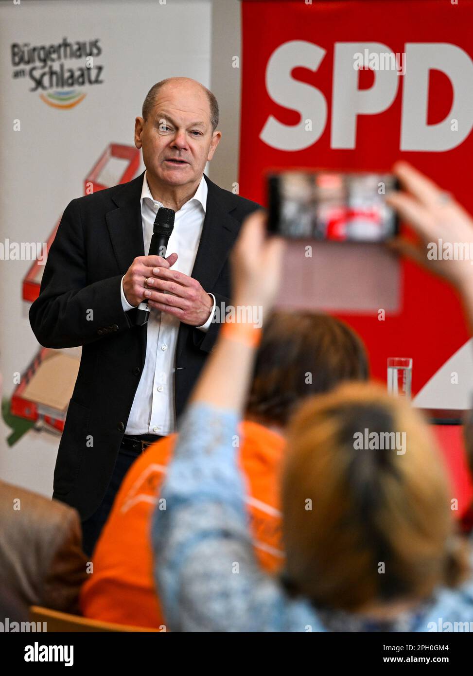 PRODUCTION - 25 March 2023, Brandenburg, Potsdam: Chancellor Olaf Scholz (SPD) takes part in a constituency discussion as a member of parliament at the Bürgerhaus am Schlaatz. Photo: Jens Kalaene/dpa Stock Photo