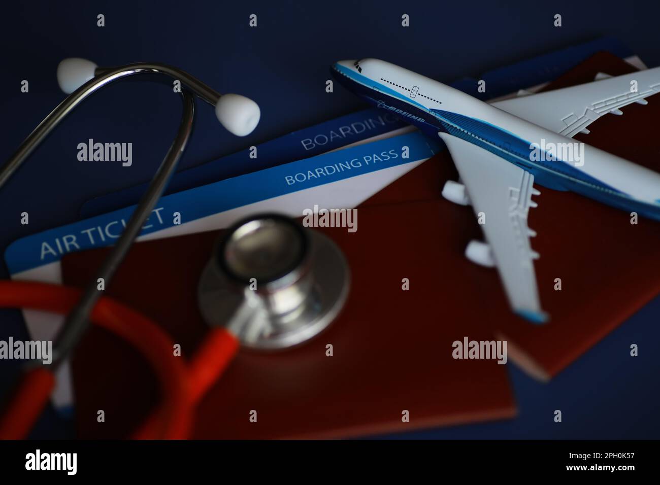 Passenger air insurance concept. Airplane, passport, boarding pass