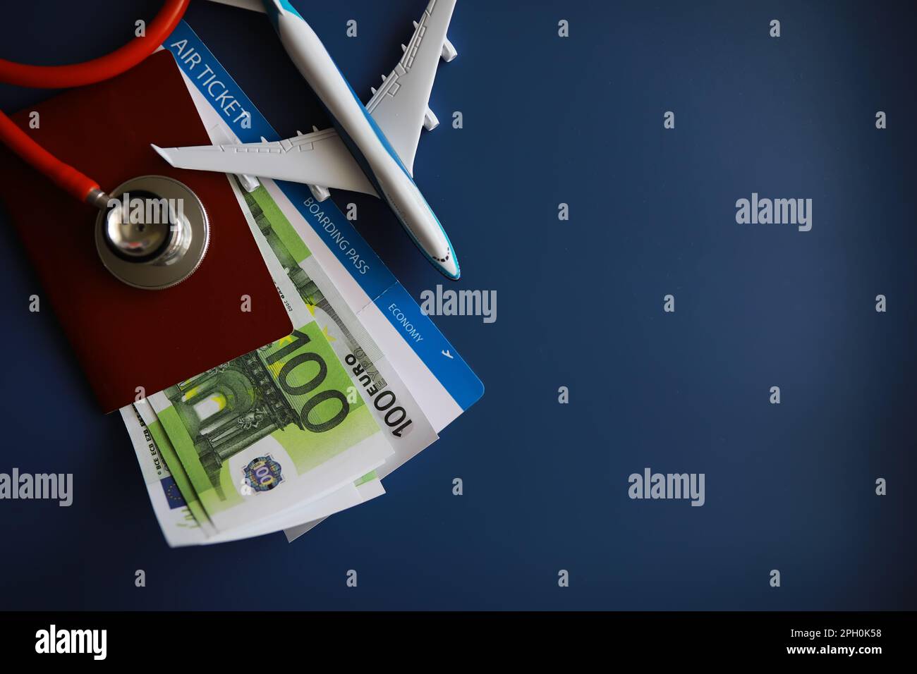 Passenger air insurance concept. Airplane, passport, boarding pass