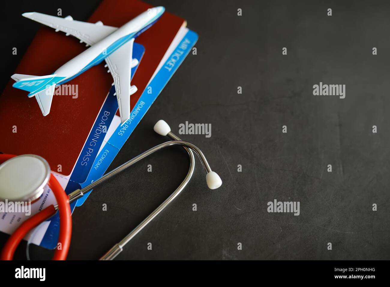 Passenger air insurance concept. Airplane, passport, boarding pass