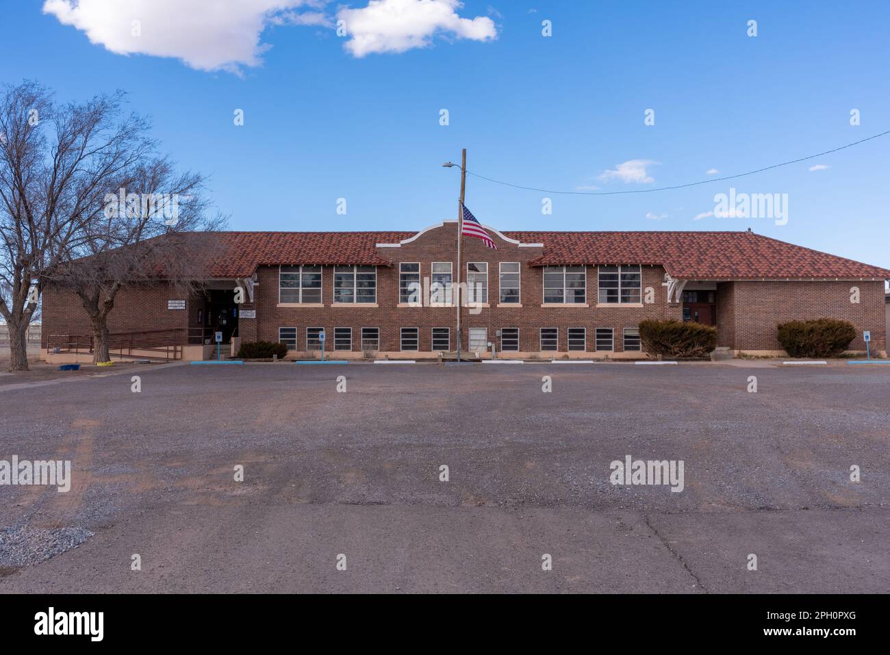 Encino Village Hall, a brick building in Encino, New Mexico, a small town, population 94, in Torrance County, United States, USA. Stock Photo