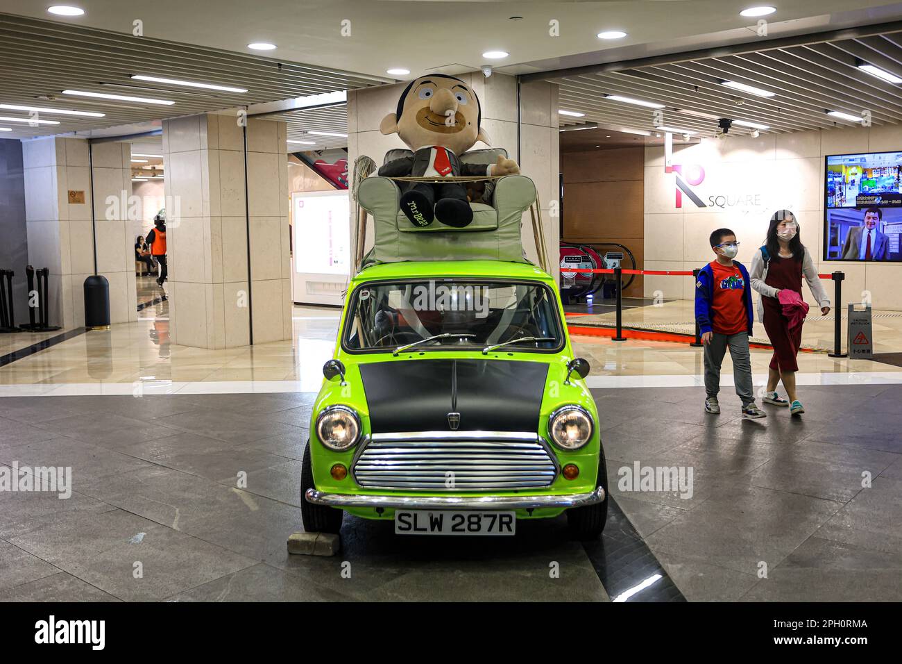 Macao, Macao, China. 25th Mar, 2023. People walk past a realistic model reconstructing the scene of MR BEAN driving with a mop while sitting atop his car, at a shopping centre in Macau, as Macao promotes tourism for post-Covid-pandemic. Known as ''Las Vegas of Asia'' for it as a city of China where gambling is legal, Macao is rolling out new facilities and programmes to attract foreign tourists, including lifting more Covid-19 restrictions. (Credit Image: © Daniel Ceng Shou-Yi/ZUMA Press Wire) EDITORIAL USAGE ONLY! Not for Commercial USAGE! Credit: ZUMA Press, Inc./Alamy Live News Stock Photo