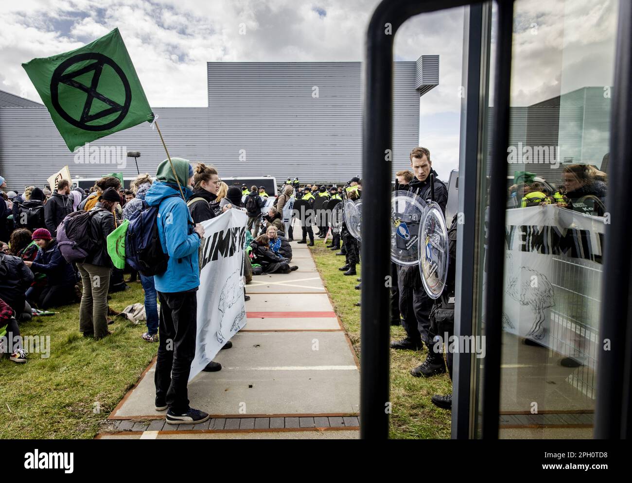 EINDHOVEN - Extinction Rebellion climate activists are taking action at Eindhoven Airport. The activists are very concerned about the damage that air traffic causes to the climate. ANP SEM VAN DER WAL netherlands out - belgium out Stock Photo