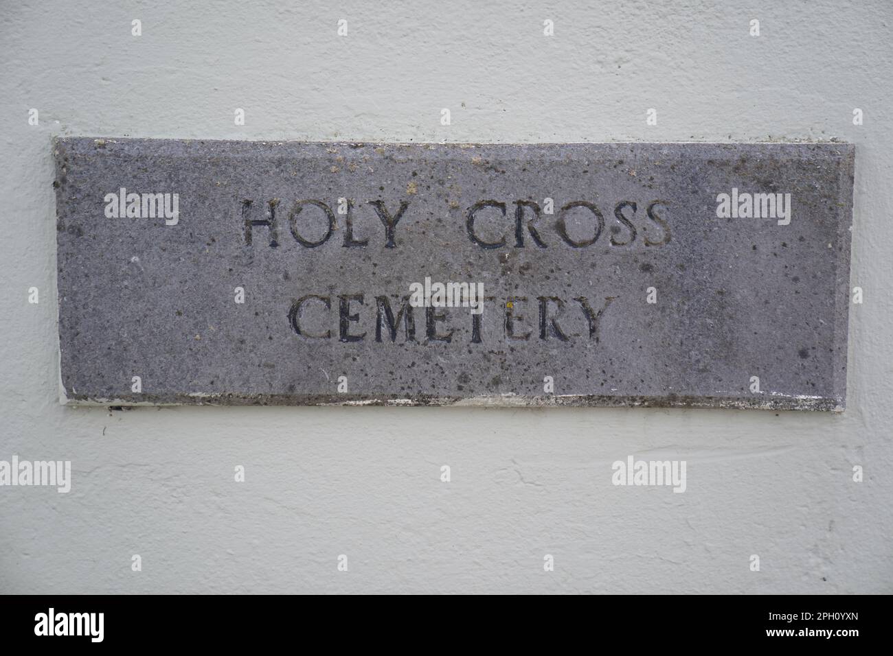 Holy Cross cemetery in Caherciveen (also Cahersiveen), Co Kerry, where 'Baby John' whose body was found with multiple stab wounds in a bag on a beach at White Strand, Caherciveen in April 1984, is buried. Picture date: Saturday March 25, 2023. Stock Photo