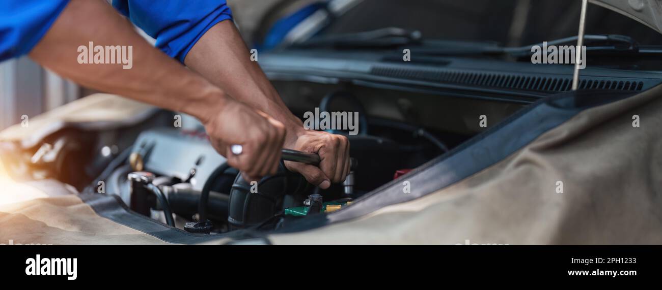 Close up technician uses multimeter voltmeter to check voltage level in