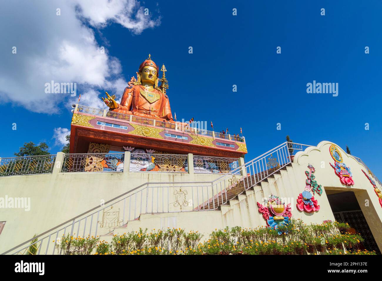 Holy statue of Guru Padmasambhava or born from a lotus, Guru Rinpoche, was a Indian tantric Buddhist Vajra master who taught Vajrayana in Tibet. Stock Photo