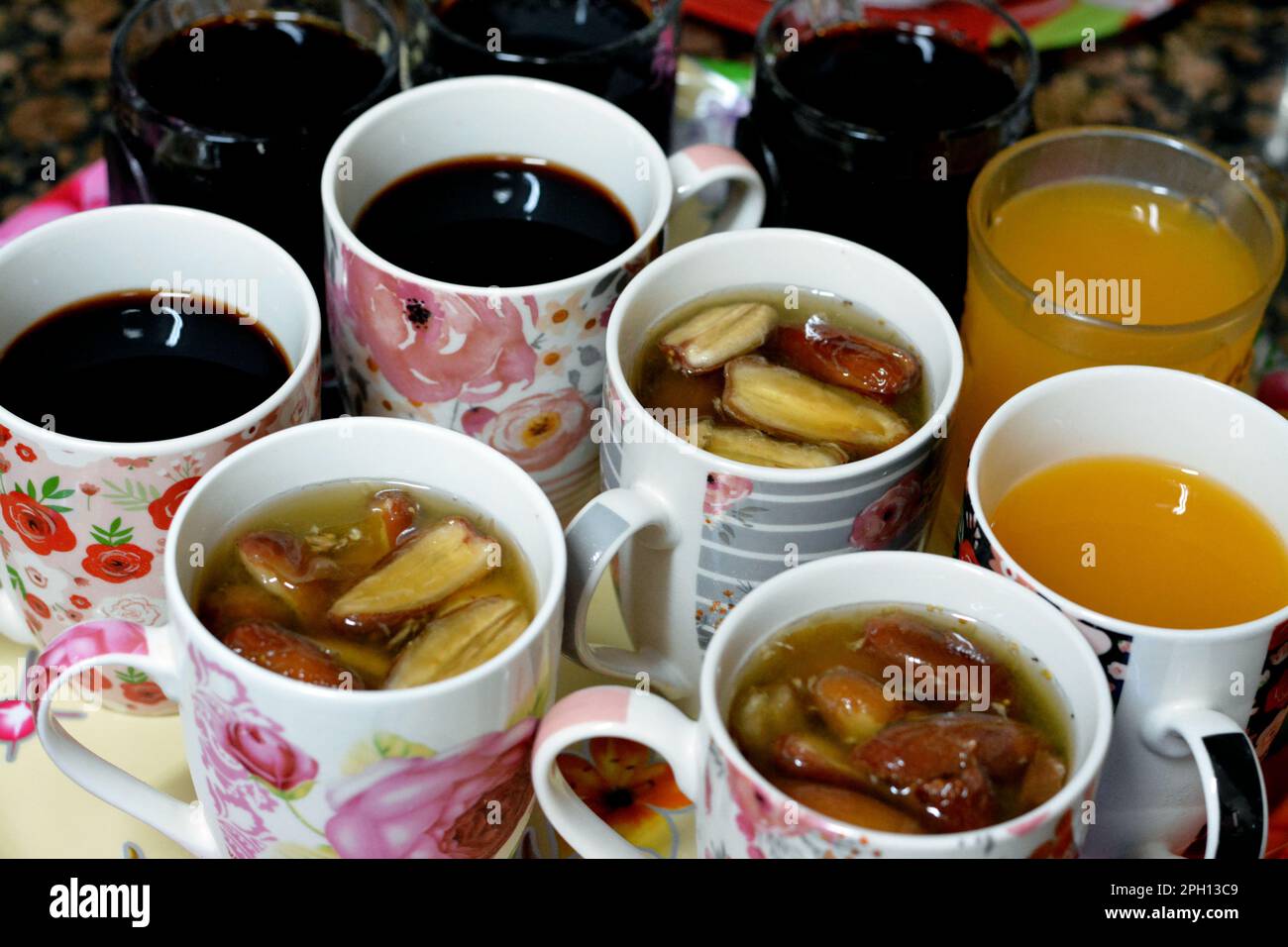 Juices, drinks and compotes tray on the iftar table in Ramadan month