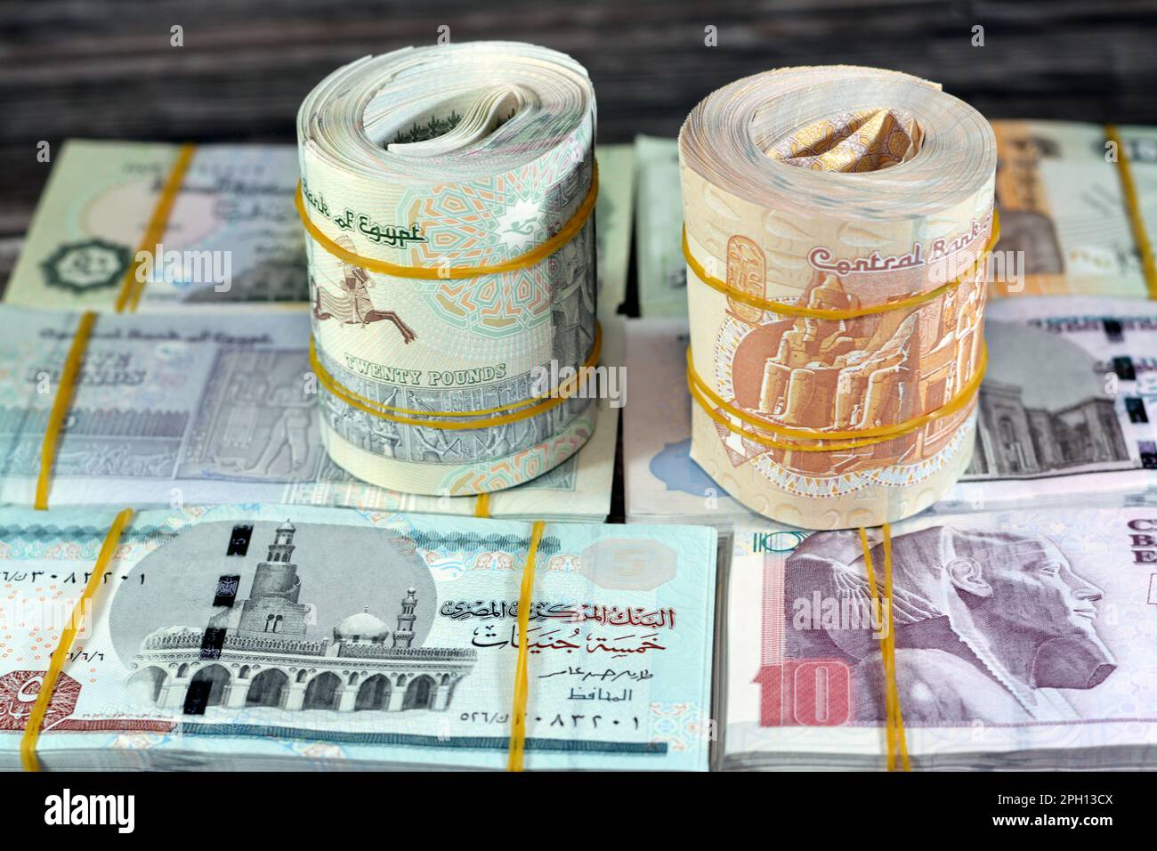 Bundles, rolls, stacks and piles of Egyptian money currency cash