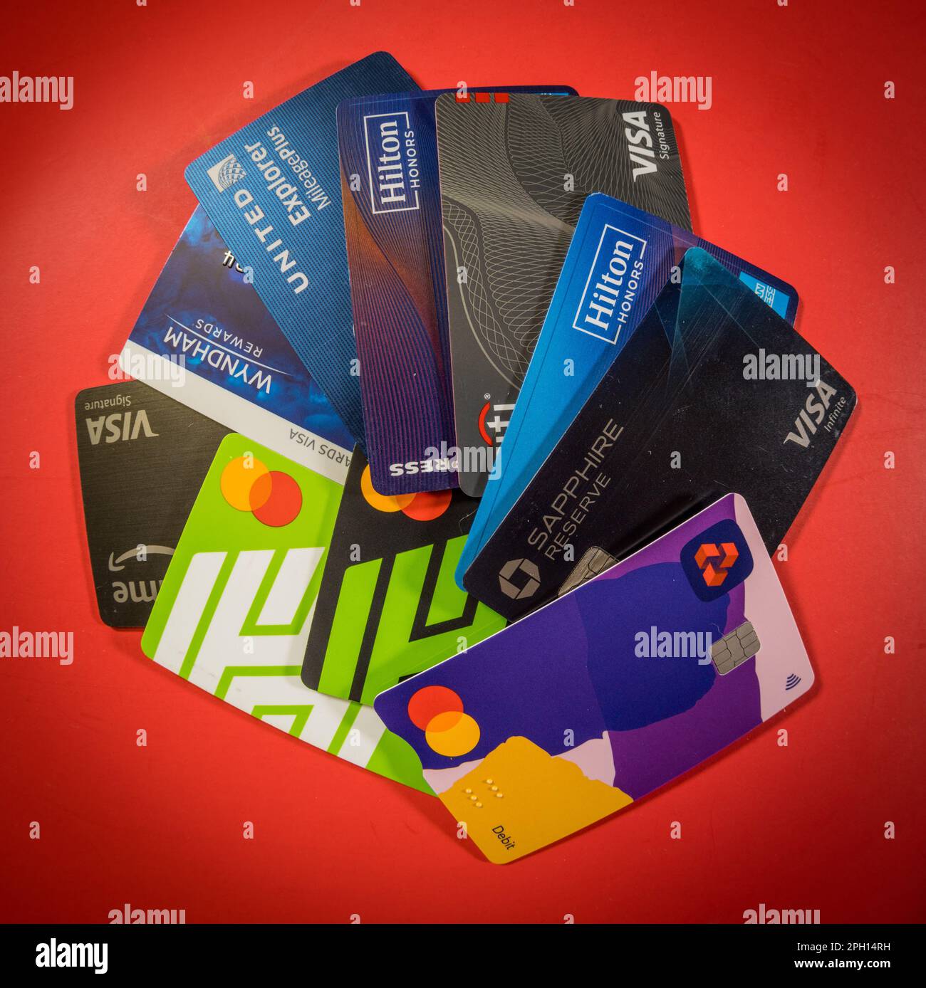 Morgantown, WV -19 March 2023: Exaggerated stack of credit cards to illustrate debt and overspending Stock Photo