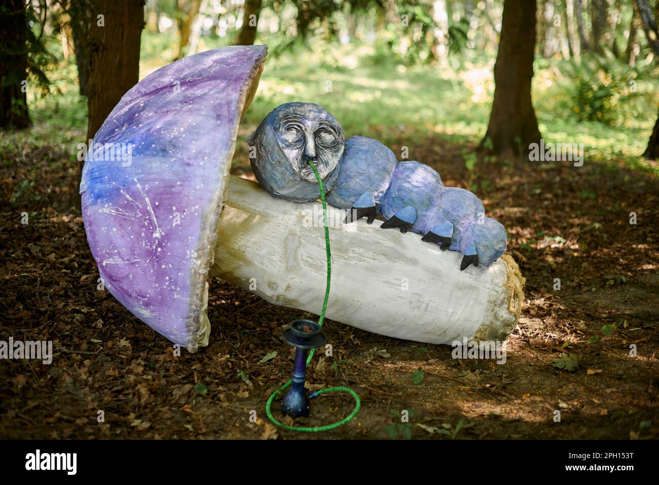 Hookah smoking caterpillar from Alice wonderland art object in outdoor