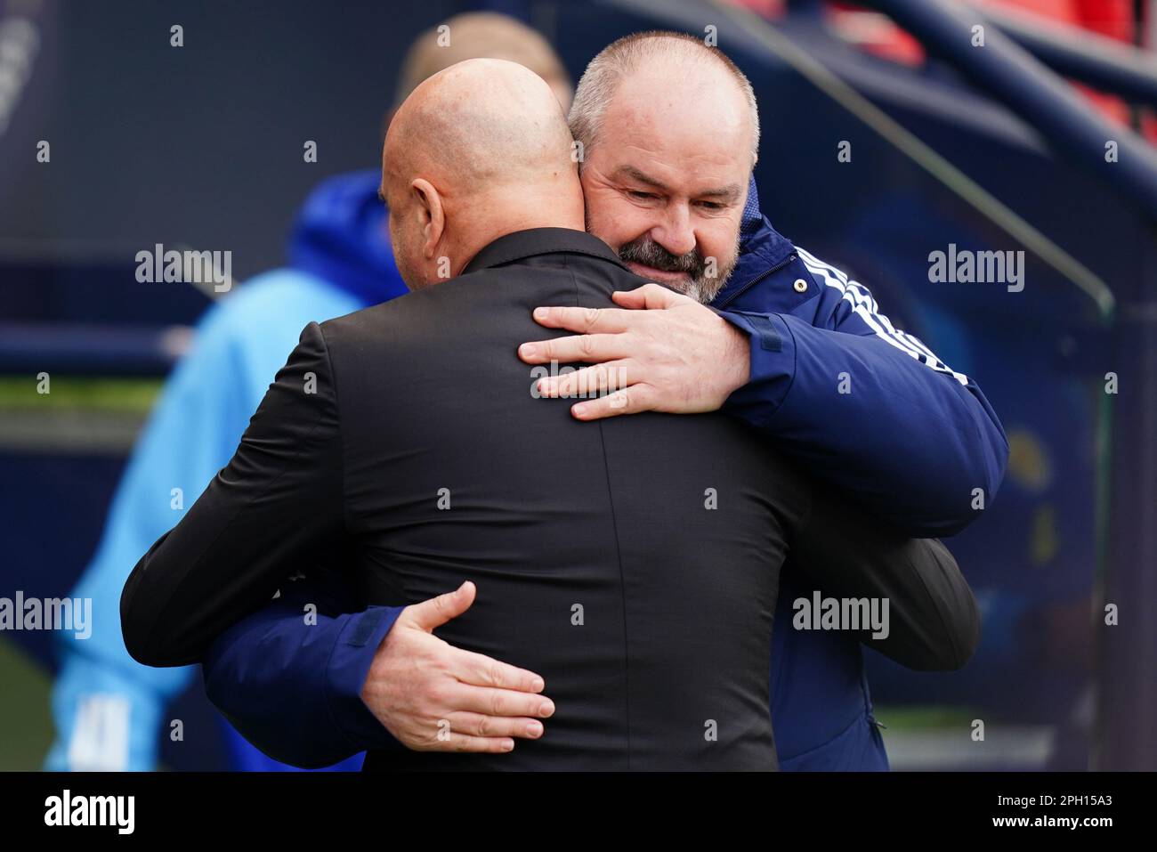 Scotland manager Steve Clarke (right) and Cyprus manager Temur Ketsbaia embrace before the UEFA Euro 2024 Group A qualifying match at Hampden Park, Glasgow. Picture date: Saturday March 25, 2023. Stock Photo