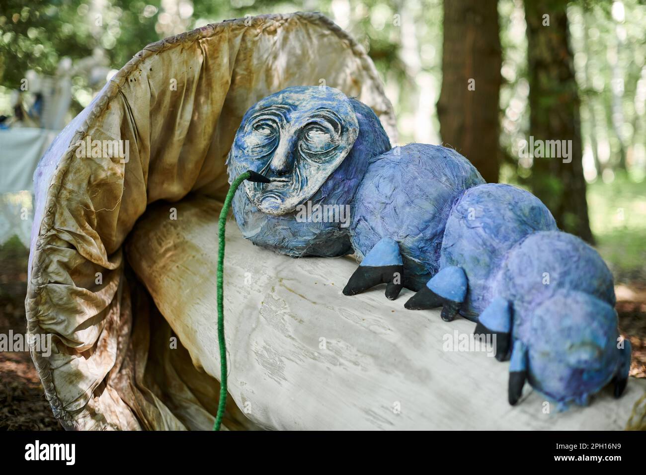 Hookah smoking caterpillar from Alice wonderland art object in outdoor