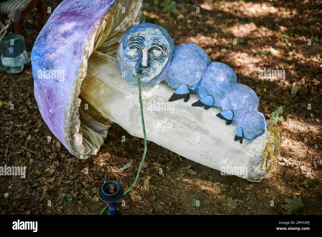 Hookah smoking caterpillar from Alice wonderland art object in outdoor