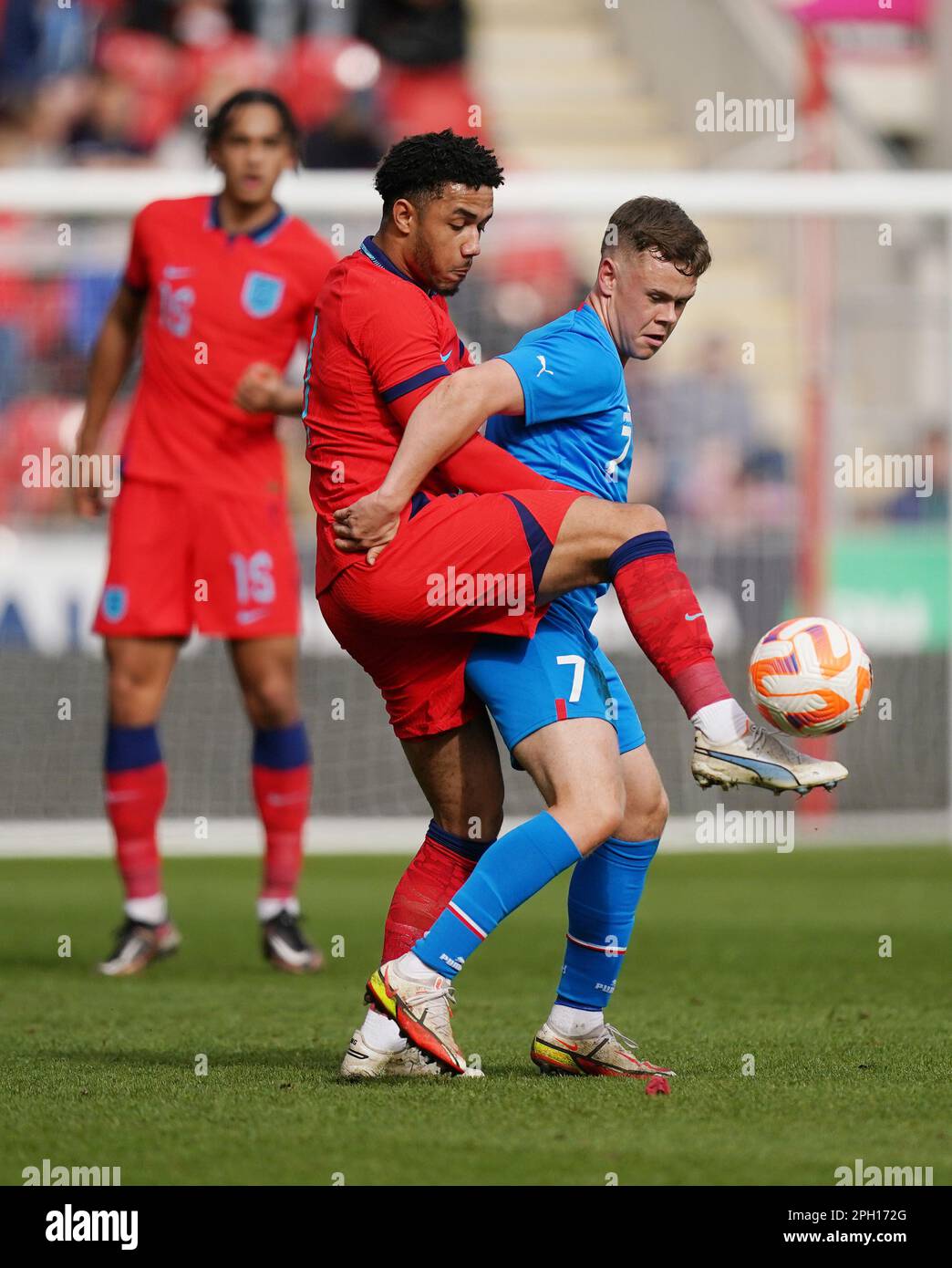 England U19's George Hall and Iceland U19's Eggert Aron Gudmundsson (right) battle for the ball during the UEFA U19 European Championship 2023 Group G qualifying match at the AESSEAL New York Stadium, Rotherham. Picture date: Saturday March 25, 2023. Stock Photo
