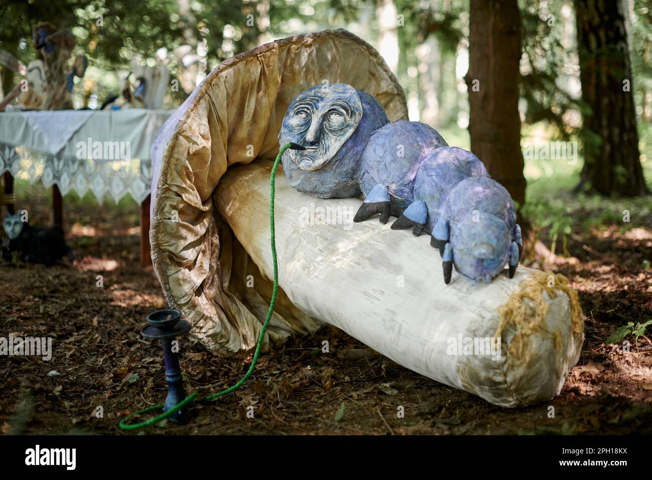 Hookah smoking caterpillar from Alice wonderland art object in outdoor