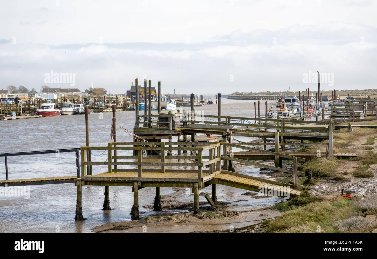 Wooden staging, piers and jetties  on the River Blyth in Walberswick on the Suffolk coast Stock Photo