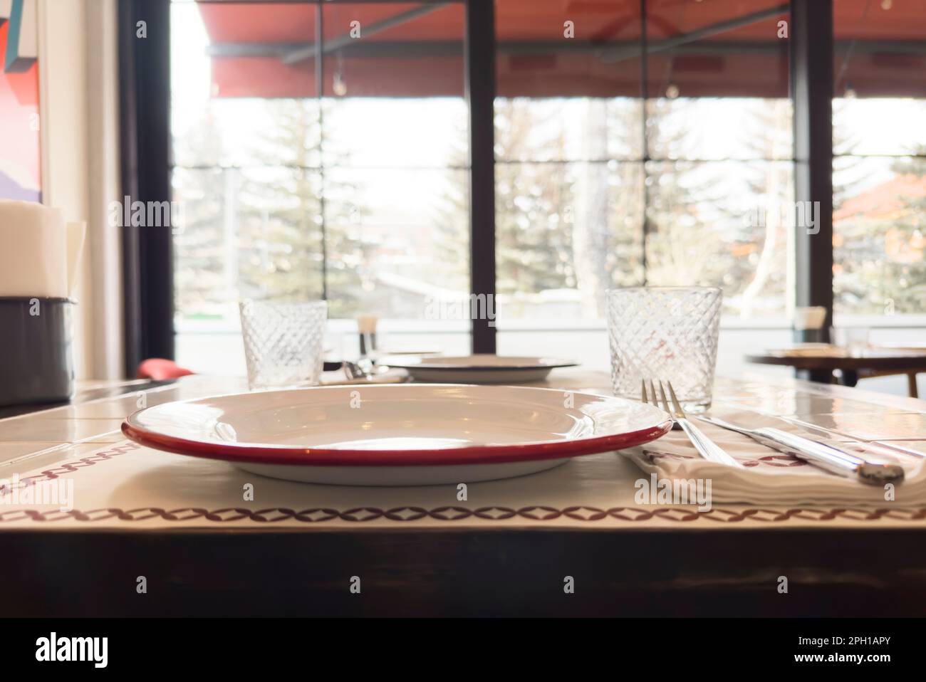 Served dinner table in a restaurant. Restaurant interior Stock Photo