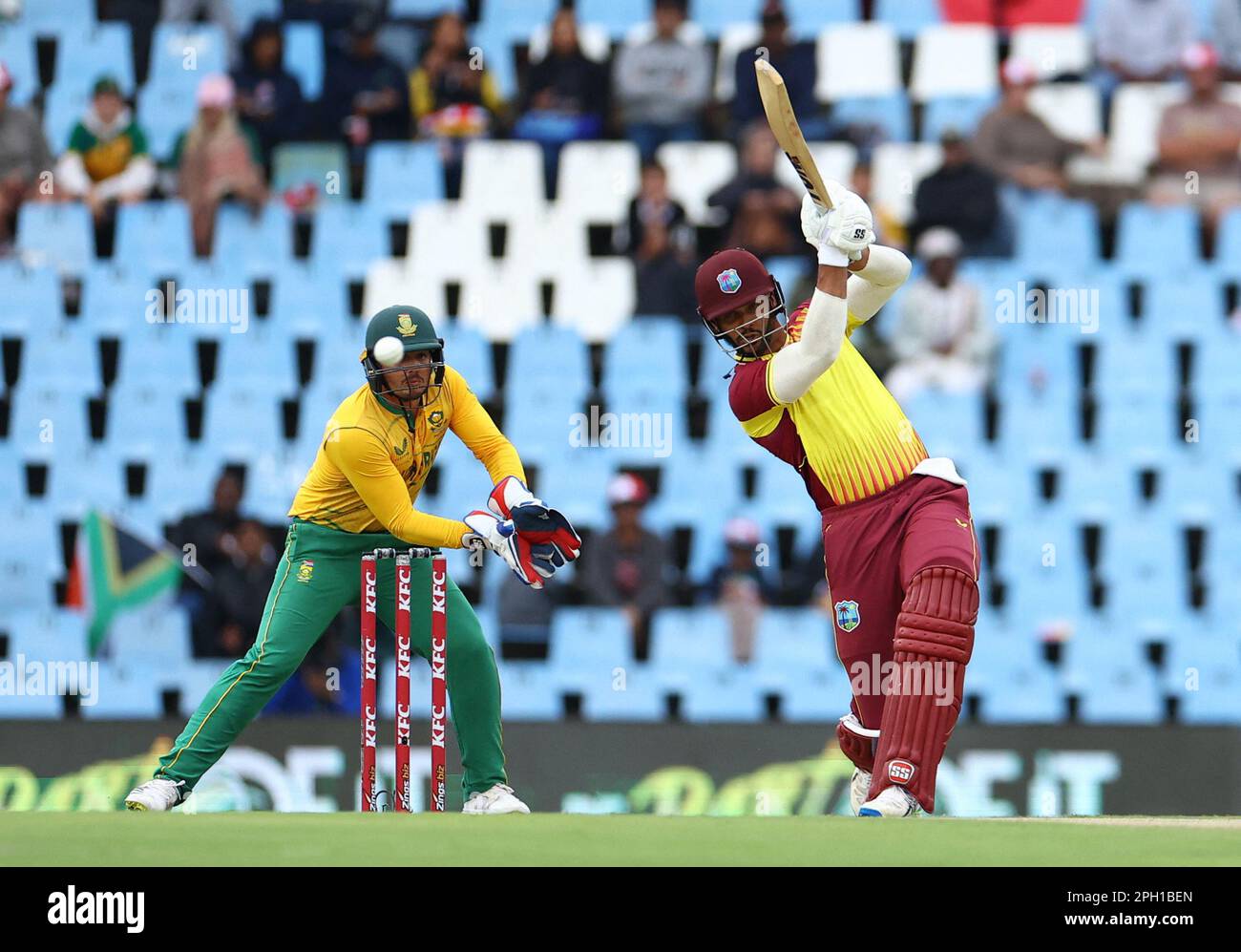 Cricket - First Twenty20 - South Africa v West Indies - SuperSport Park Cricket Stadium, Centurion, South Africa - March 25, 2023 West Indies' Brandon King in action with South Africa's Quinton de Kock REUTERS/Siphiwe Sibeko Stock Photo