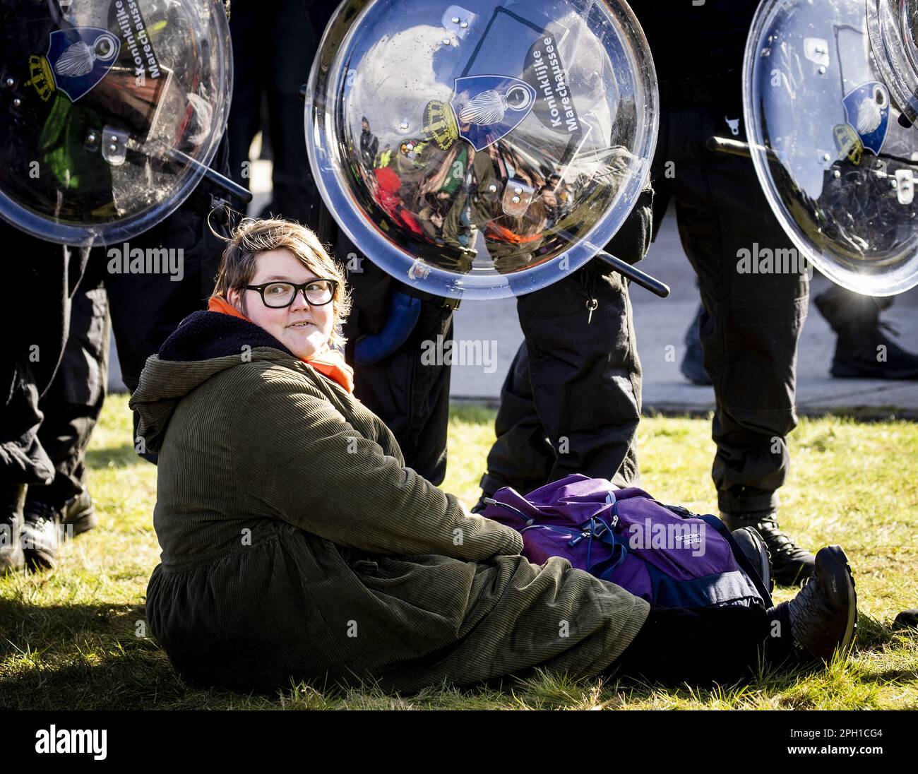 Eindhoven, Netherlands. 25th Mar 2023. EINDHOVEN - Asha ten Broeke is arrested during an action by Extinction Rebellion at Eindhoven Airport. The activists are very concerned about the damage that air traffic causes to the climate. ANP SEM VAN DER WAL netherlands out - belgium out Credit: ANP/Alamy Live News Stock Photo