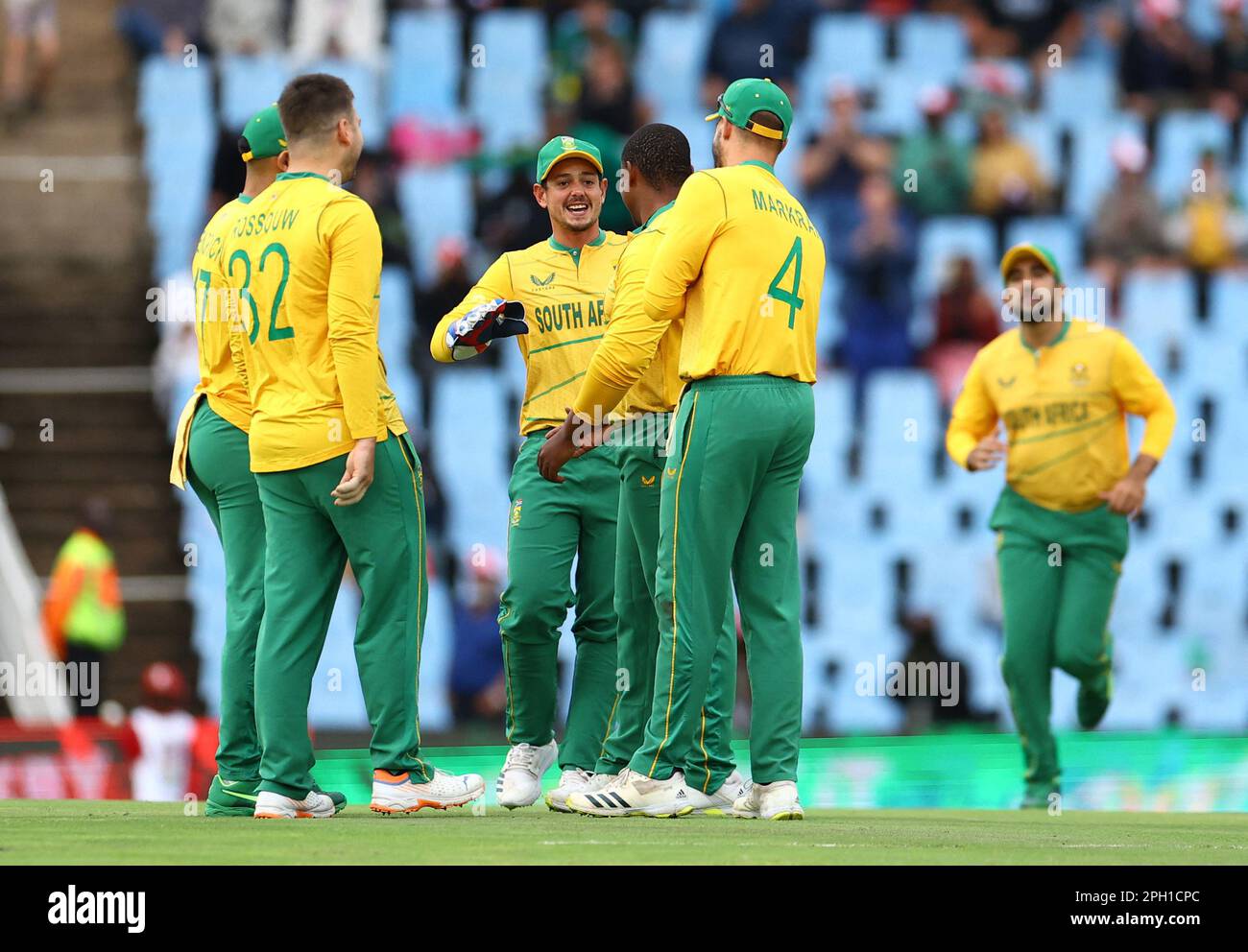 Cricket - First Twenty20 - South Africa v West Indies - SuperSport Park Cricket Stadium, Centurion, South Africa - March 25, 2023 South Africa's Quinton de Kock celebrates the wicket of West Indies' Brandon King with teammates REUTERS/Siphiwe Sibeko Stock Photo
