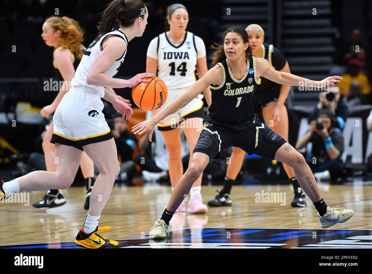 March 24, 2023: Colorado Buffaloes guard Tayanna Jones (1) plays defense against Iowa Hawkeyes guard Caitlin Clark (22), who scored 31 points, during the NCAA women's NCAA Regional Semifinal basketball game between the Colorado Buffaloes and Iowa Hawkeyes at Climate Pledge Arena in Seattle, WA. Iowa defeated Colorado 87-77 to advance to the the Elite 8. Steve Faber/CSM Stock Photo