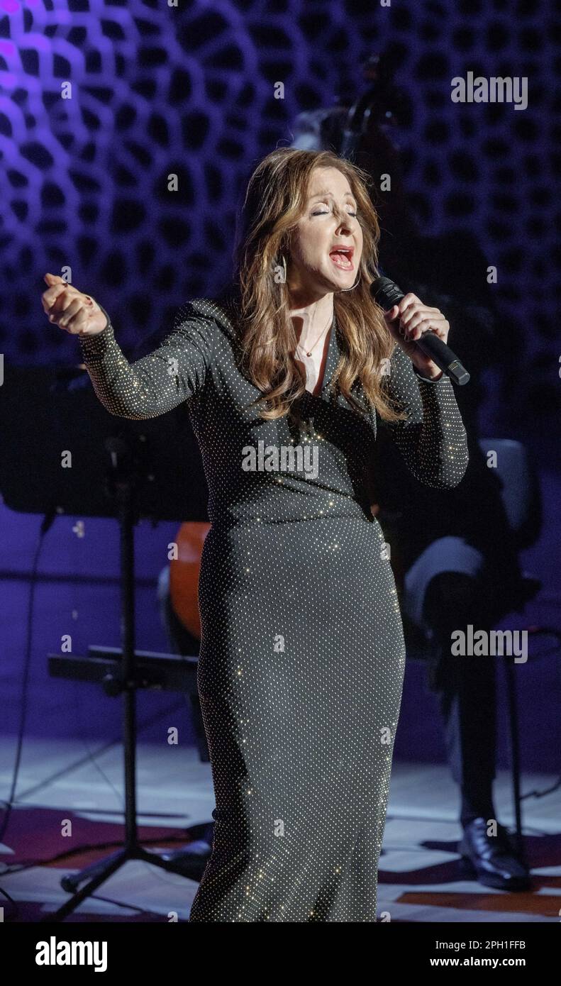 25 March 2023, Hamburg: Singer Vicky Leandros sings at her I love life  concert at Hamburgs Elbphilharmonie, kicking off her farewell tour. Photo:  Markus Scholzdpa Stock Photo - Alamy