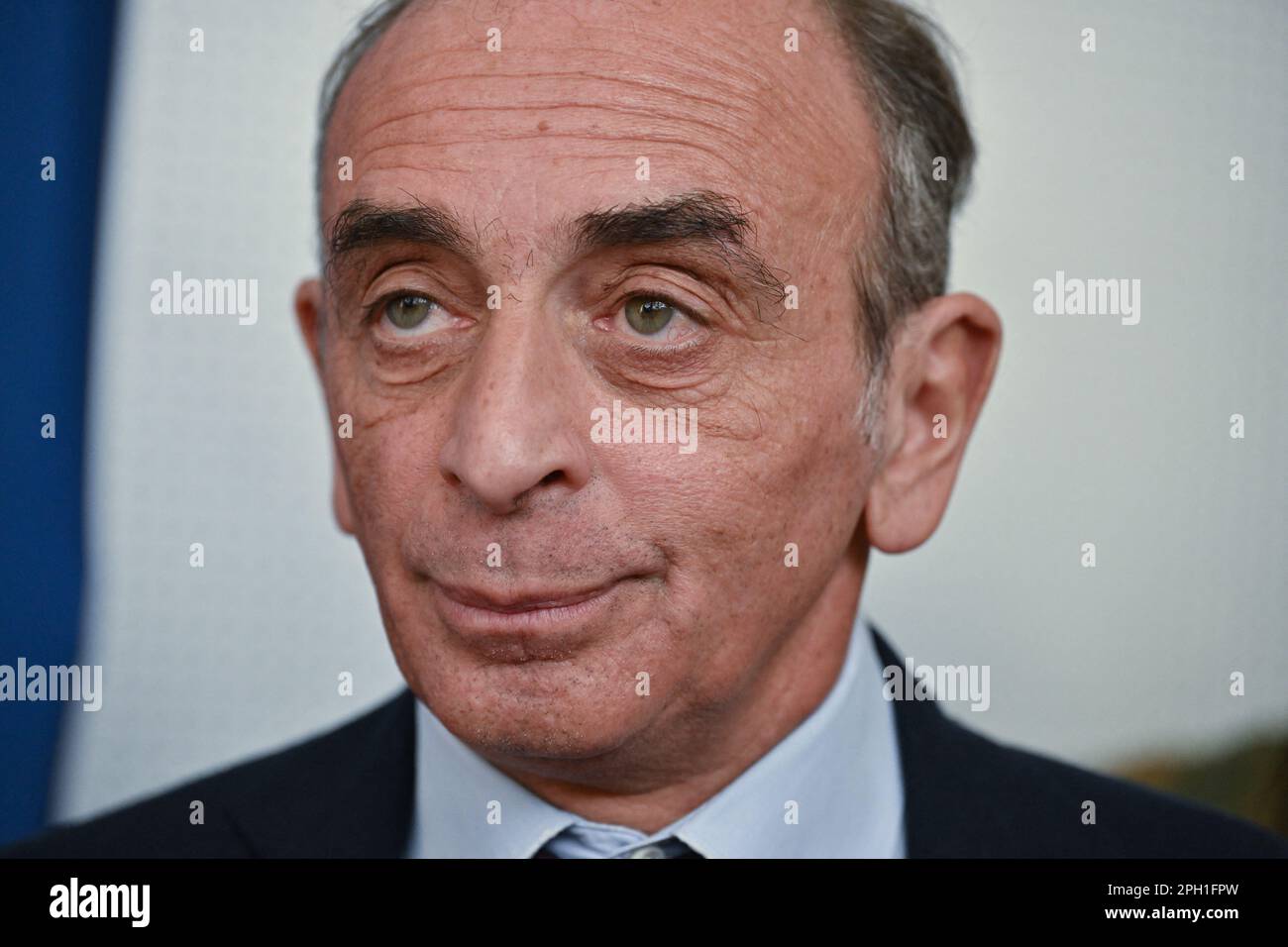 Eric Zemmour, president of the far right party Reconquete, signs
