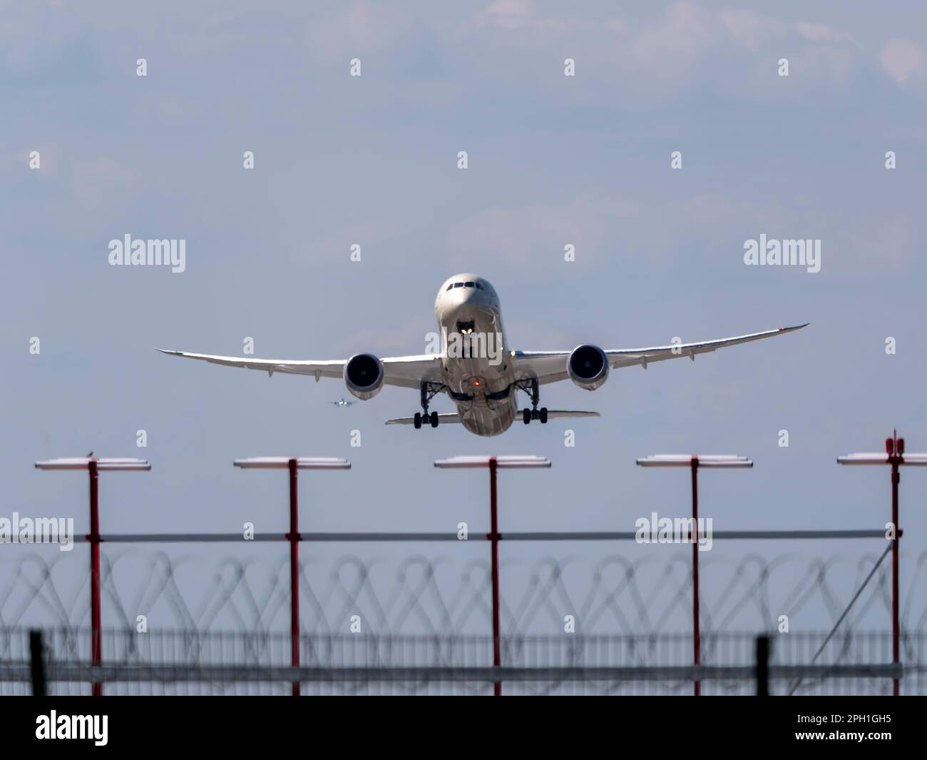 MOSCOW , RUSSIA, June 10, 2019: The Commercial passenger airplane flying overhead on sunny day on June 10, 2019 in Moscow, Russia. Stock Photo